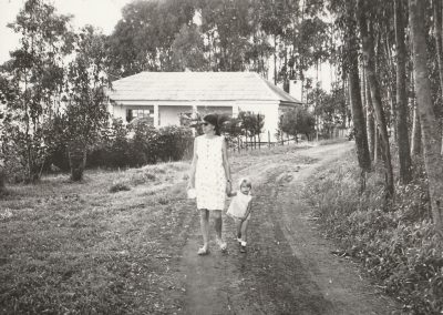 Erna, pregnant, walking to hospital 1970